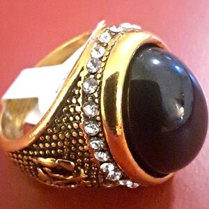 Gold Ring with a Large Black Stone